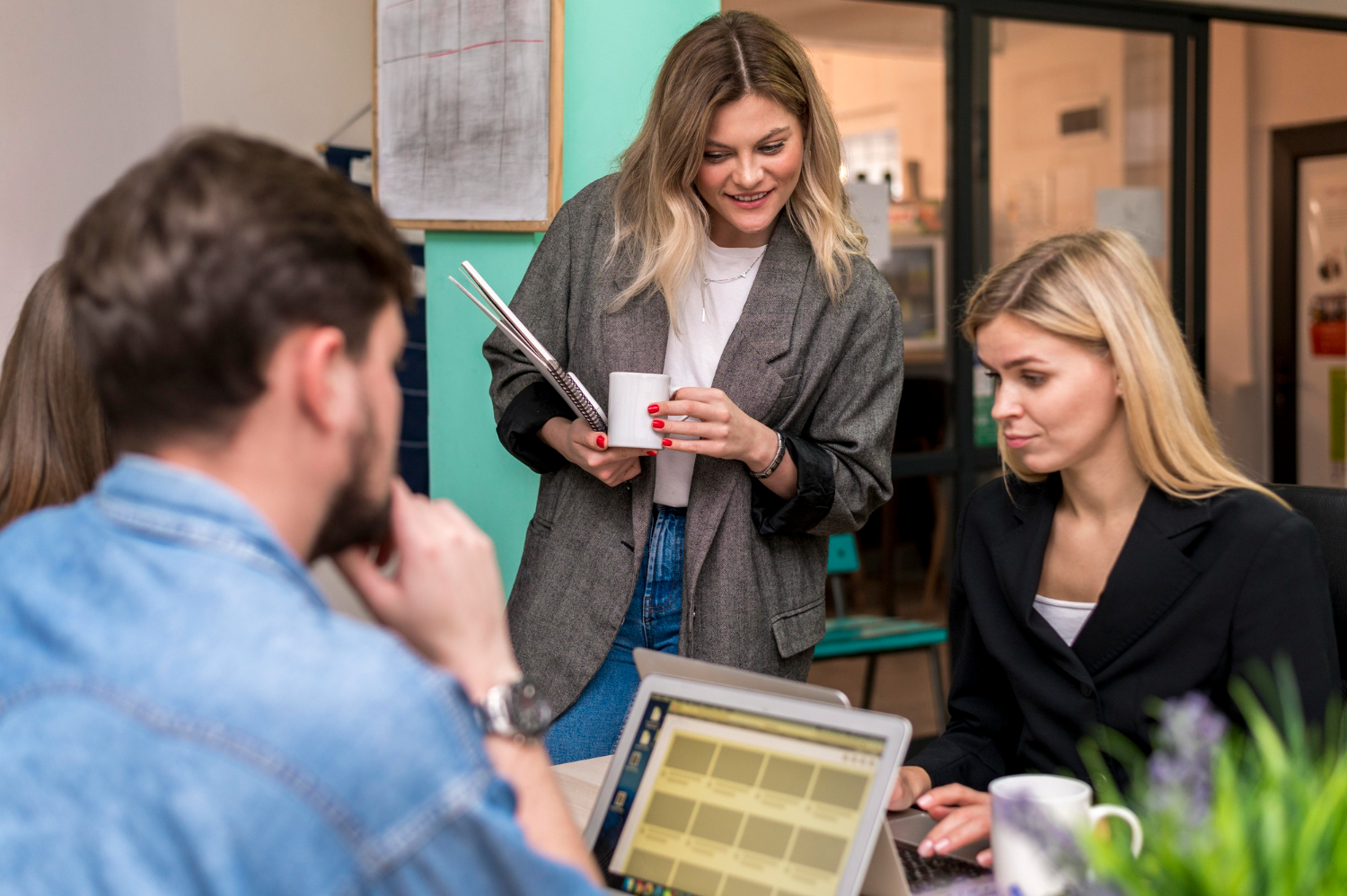 Team collaboration in office meeting