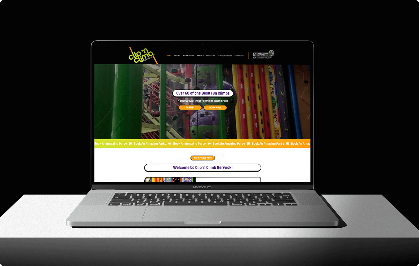 Laptop displaying the Clip 'n Climb Berwick website