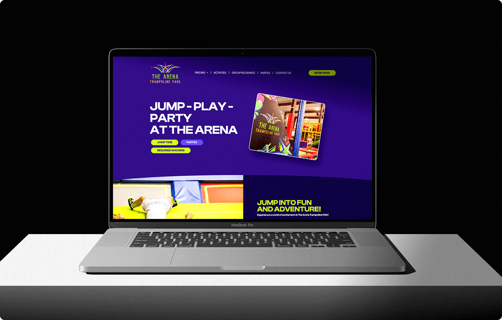 The Arena Trampoline Park website on a laptop