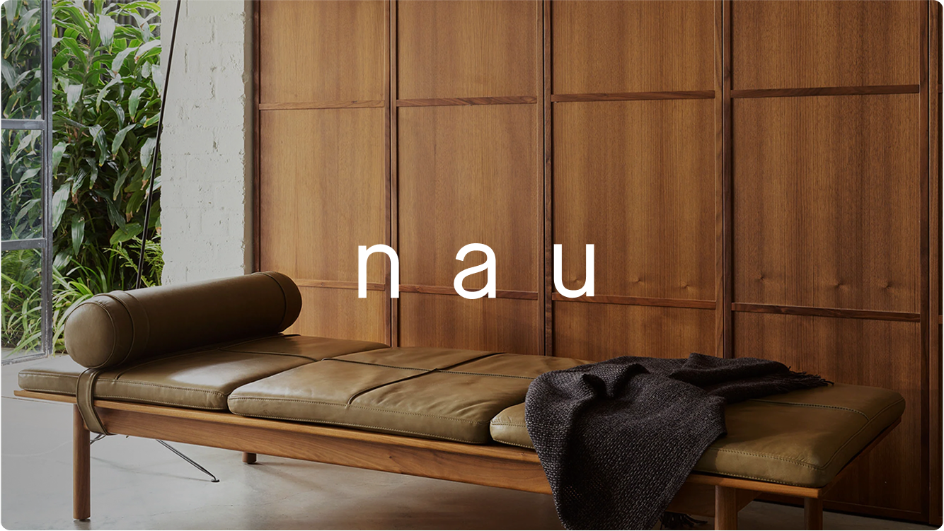 Leather daybed with "nau" text